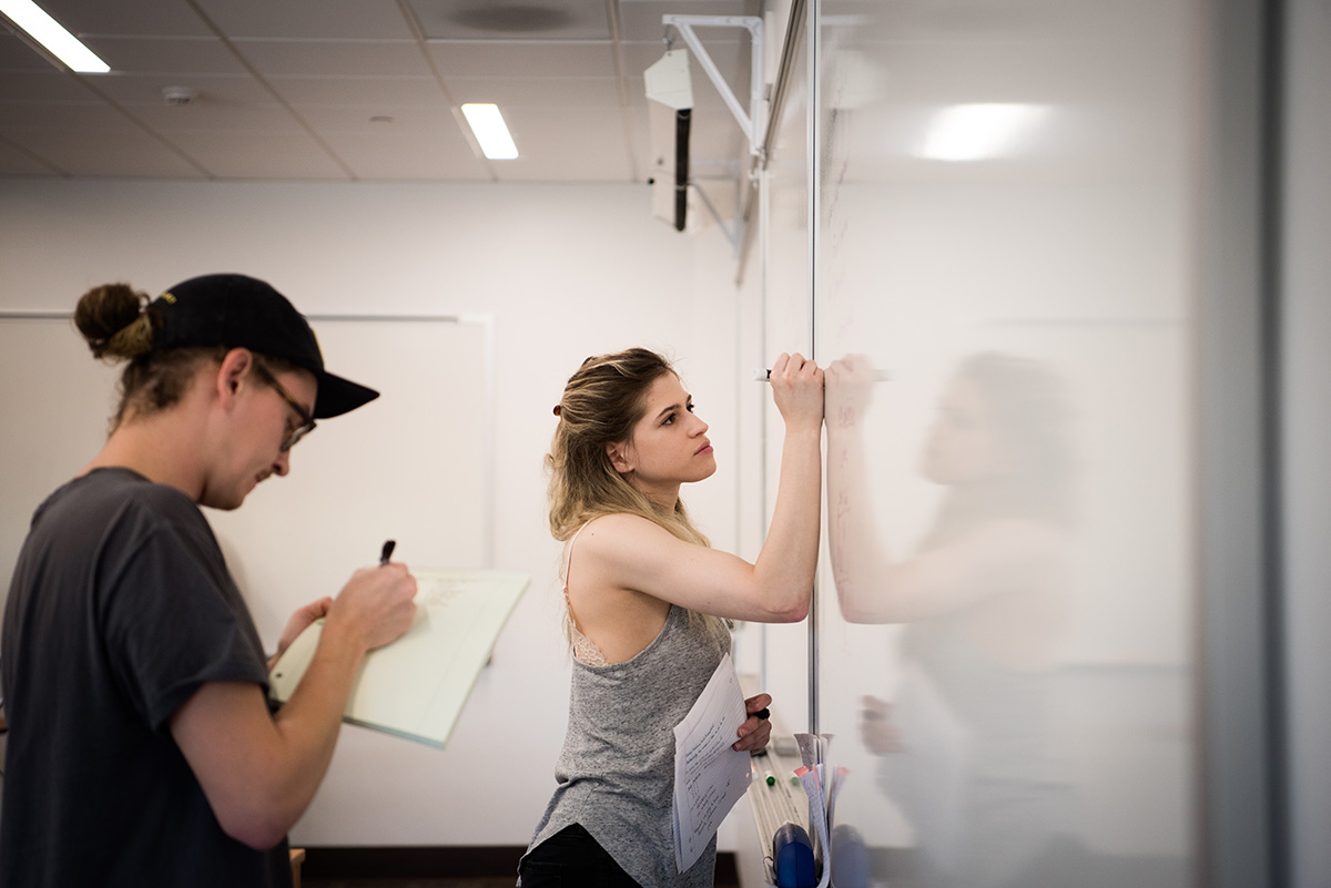 Students at white board