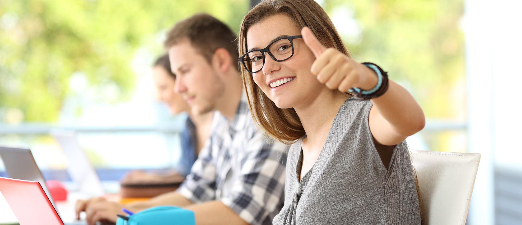 Thumbs up student